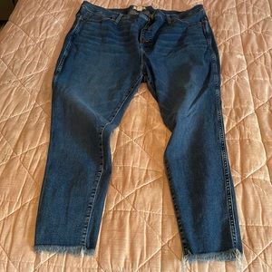 Madewell button front jeans with fringe hem